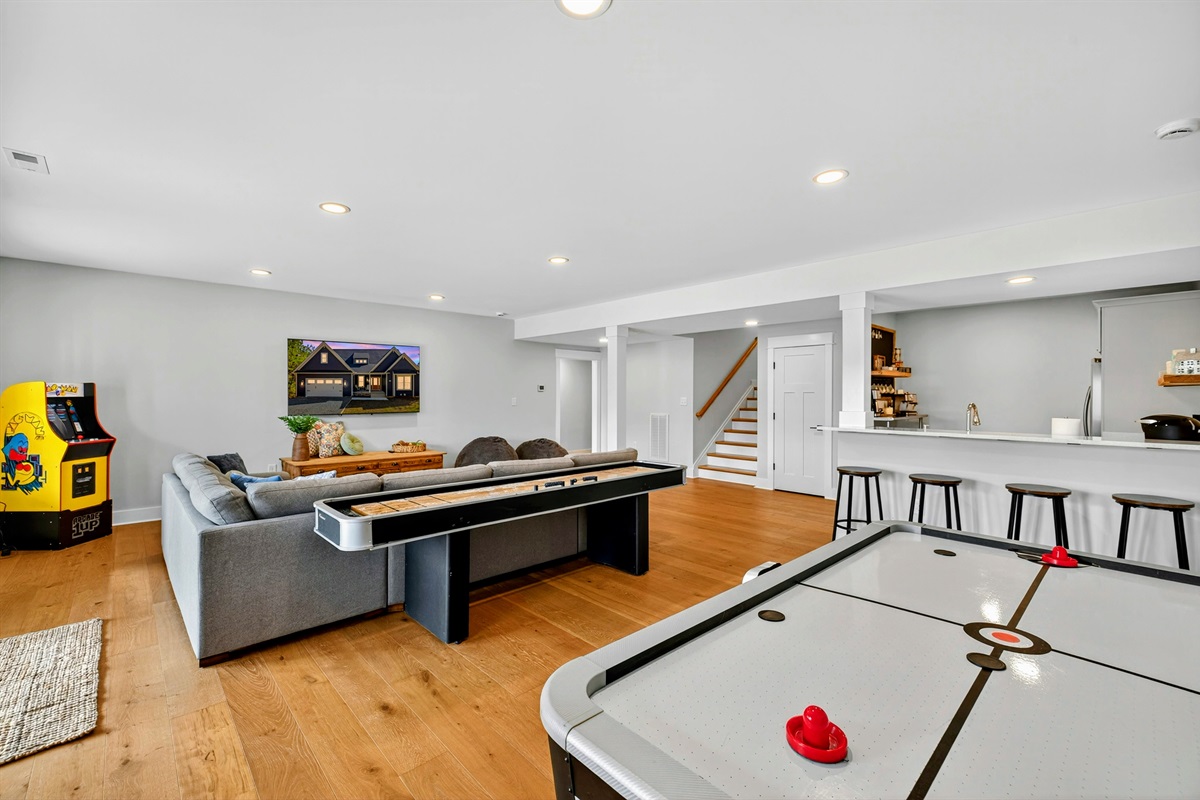 Amazing basement perfect for family's vacationing together w/ kitchen & coffee bar, and two kings and quad bunk room. Game room has it all: arcade game, shuffleboard, air hockey, ping-pong!