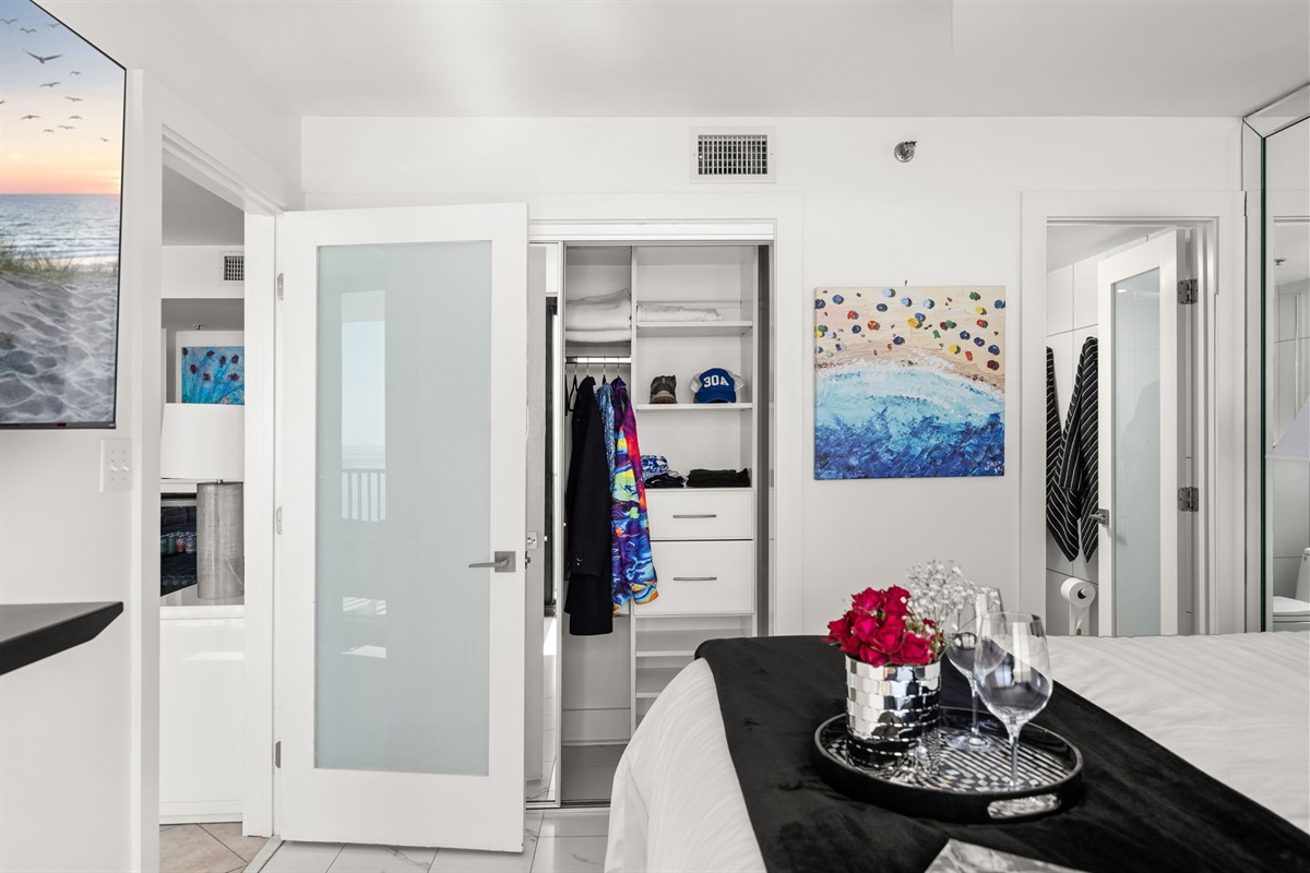 Unpack, settle in, and relax. Our built-in cabinets keep the master neat, open, and easy to enjoy. We also have a 55' inch Smart TV for you to watch a movie on.