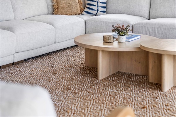 Subtle elegance meets laid-back luxury in this thoughtfully styled living area, inspired by South Florida&rsquo;s coastal charm.