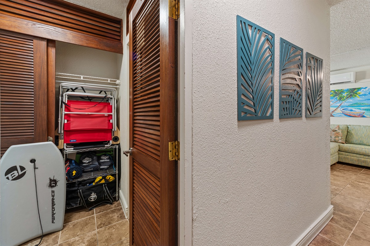 First door on the right down the hallway from the living room is the primary bedroom. 