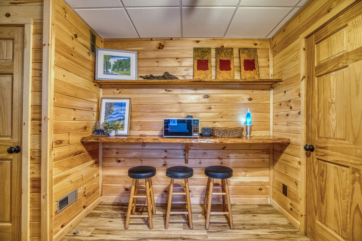 Lower-level work counter with stools.