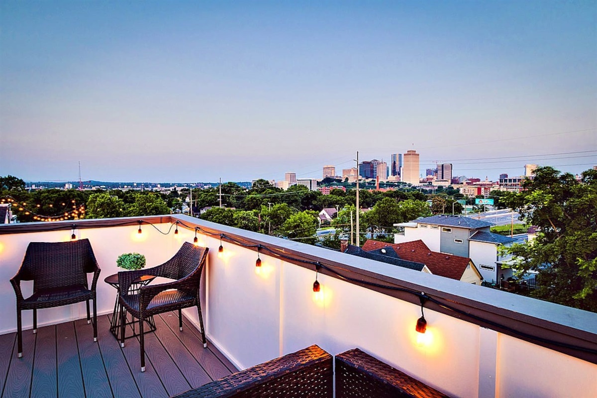 - Sip morning coffee or evening wine with panoramic skyline views stretching for miles - Bistro seating for two, perfect for private chats under string lights and sunset skies - Peaceful yet vibrant atmosphere for soaking in the city from above