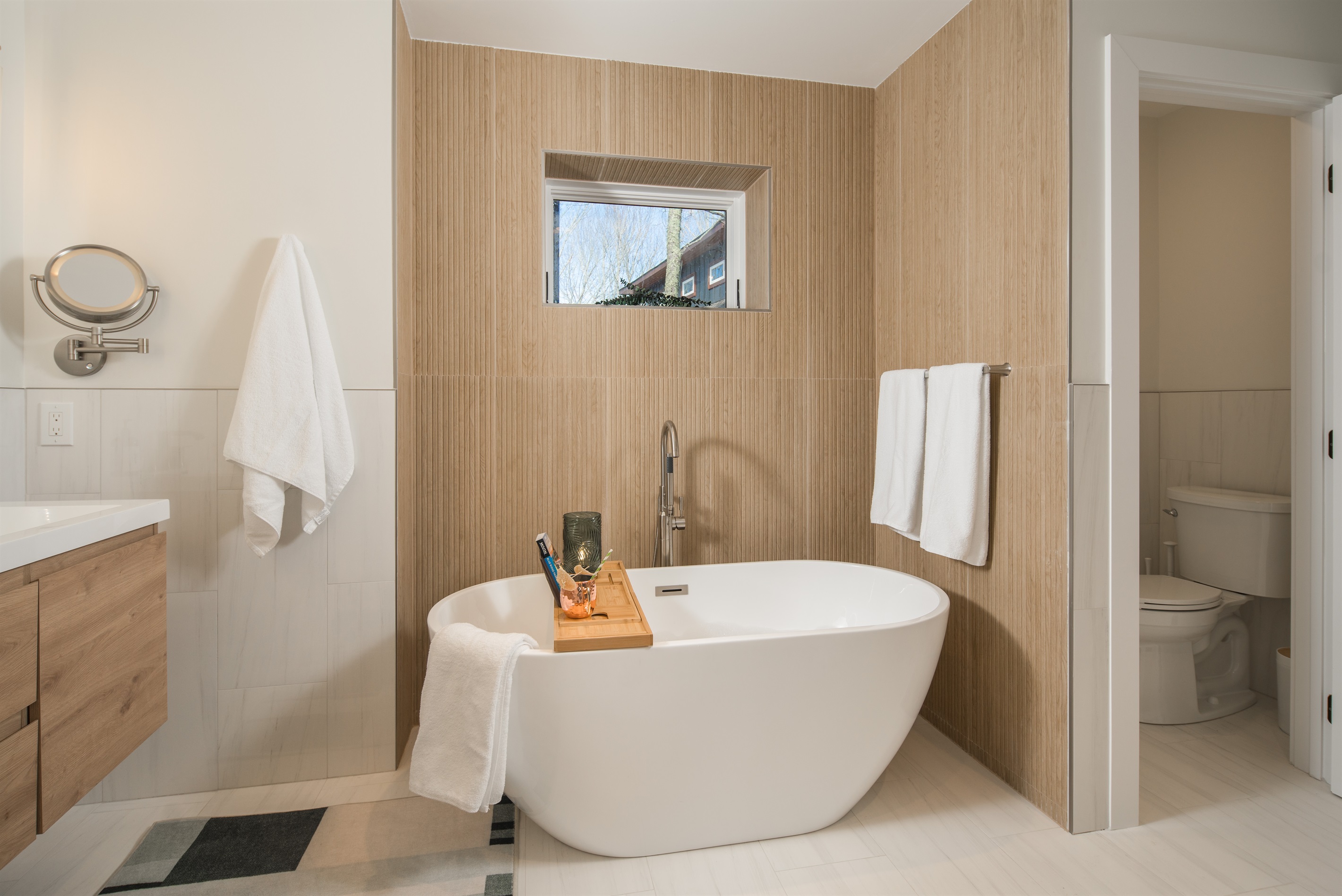 Unwind in the freestanding bathtub after a day exploring in the mountains.