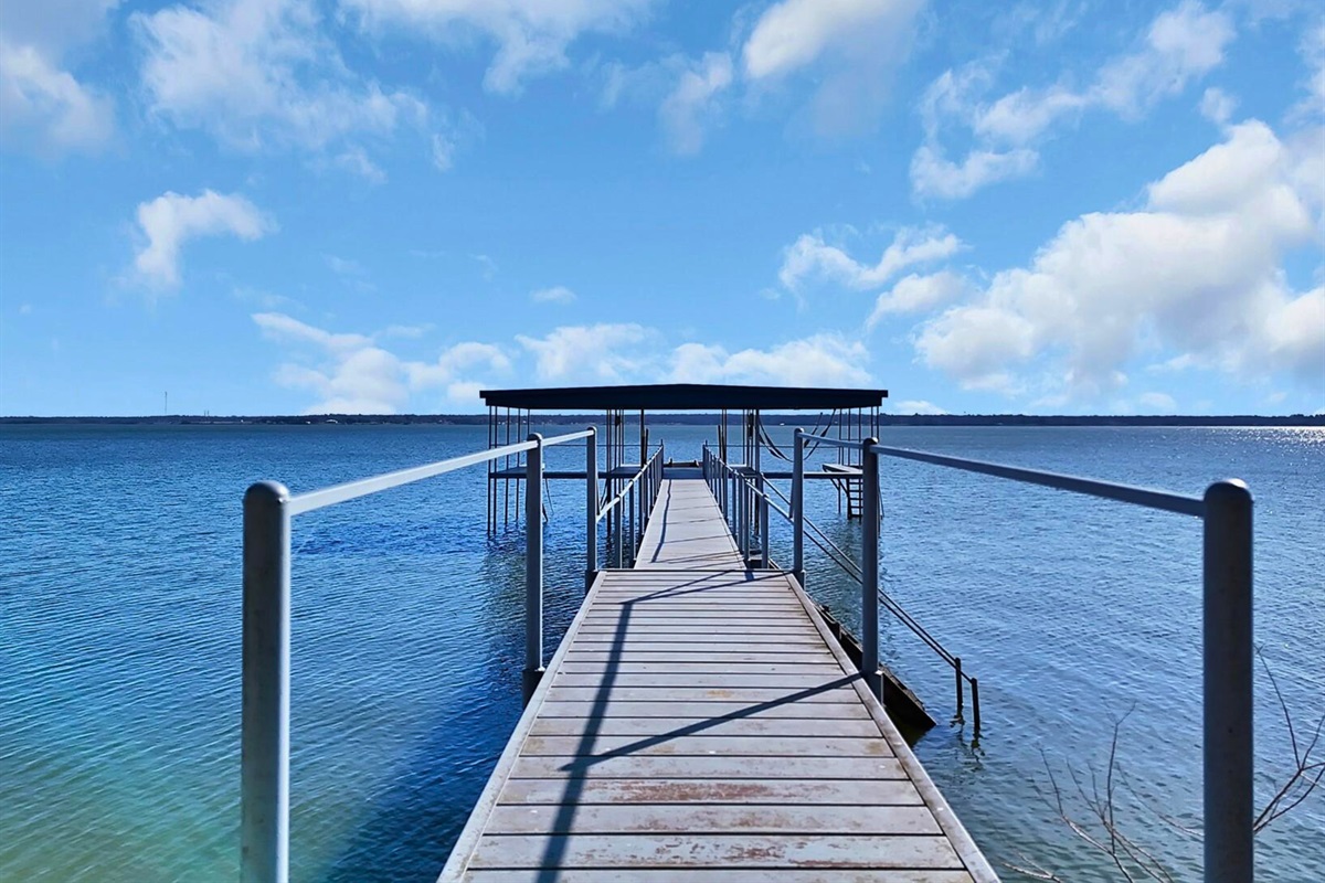 Morning coffee hits different when you’re walking out to your private dock on the water.