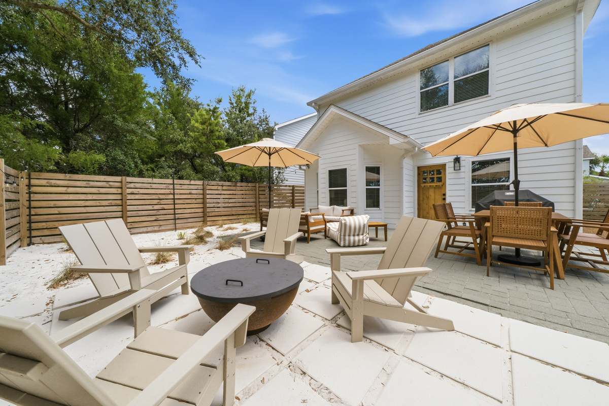 Newly renovated and landscaped back yard oasis.  Plenty of seating for everyone and a massive firepit for storytelling and making smores