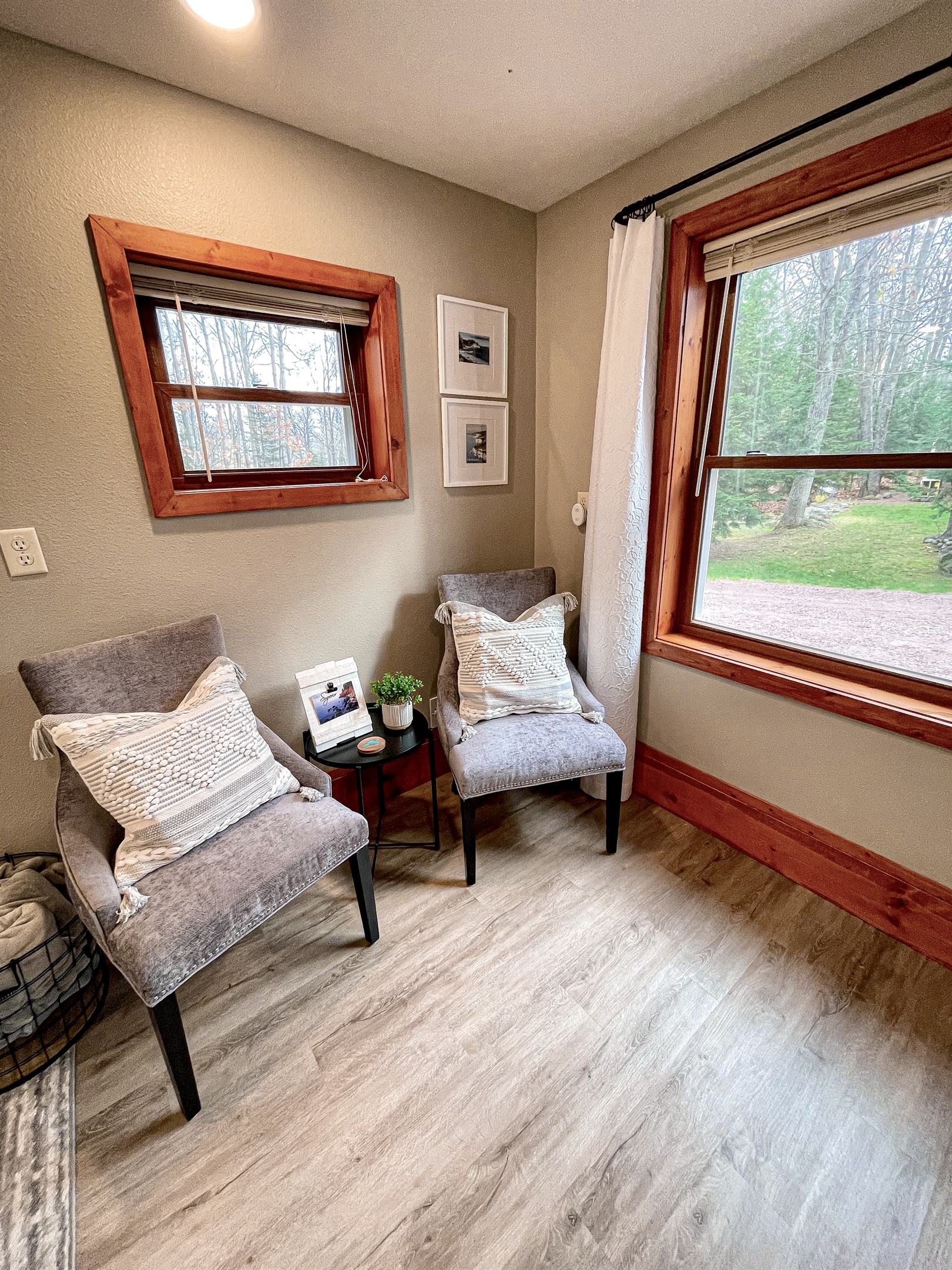 Bedroom lower level seating area next to the large window    *note this is main lower entry level must take stairs to access upper loft kitchen living bathroom* 