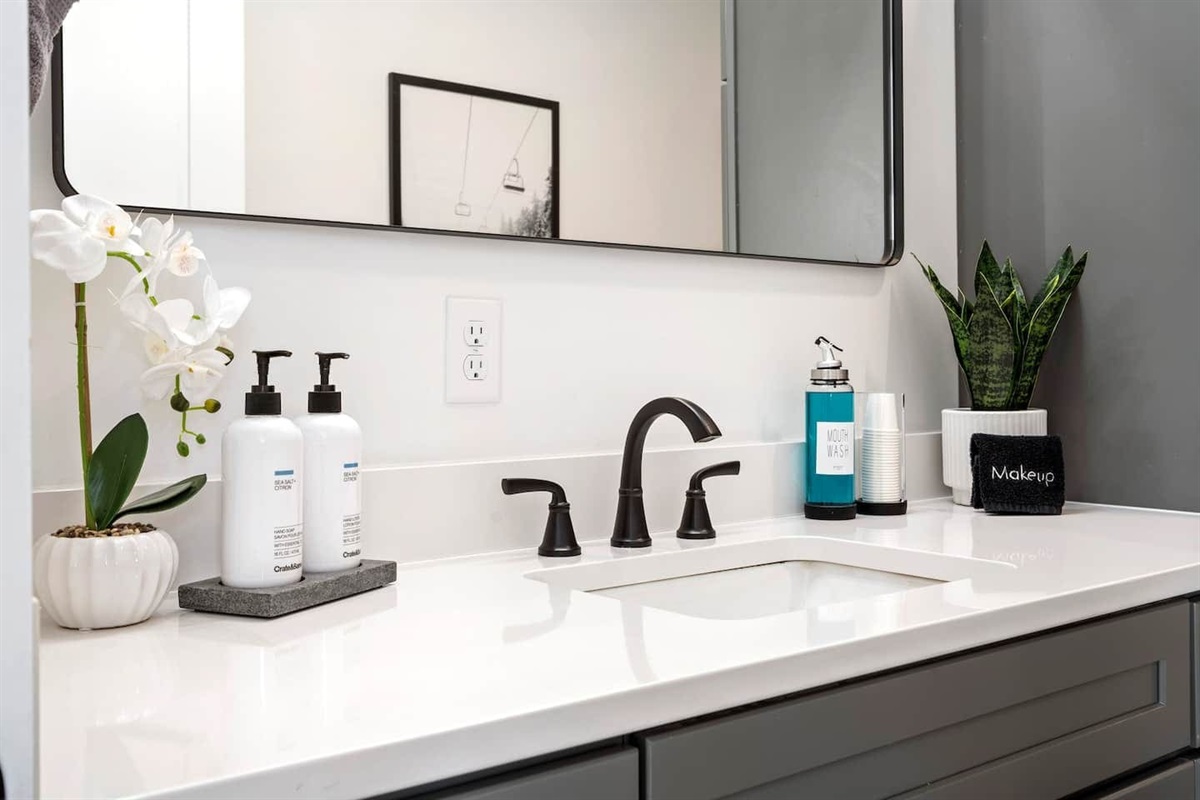Function meets style in this beautiful main floor bath.  Love the clean lines and modern finishes.