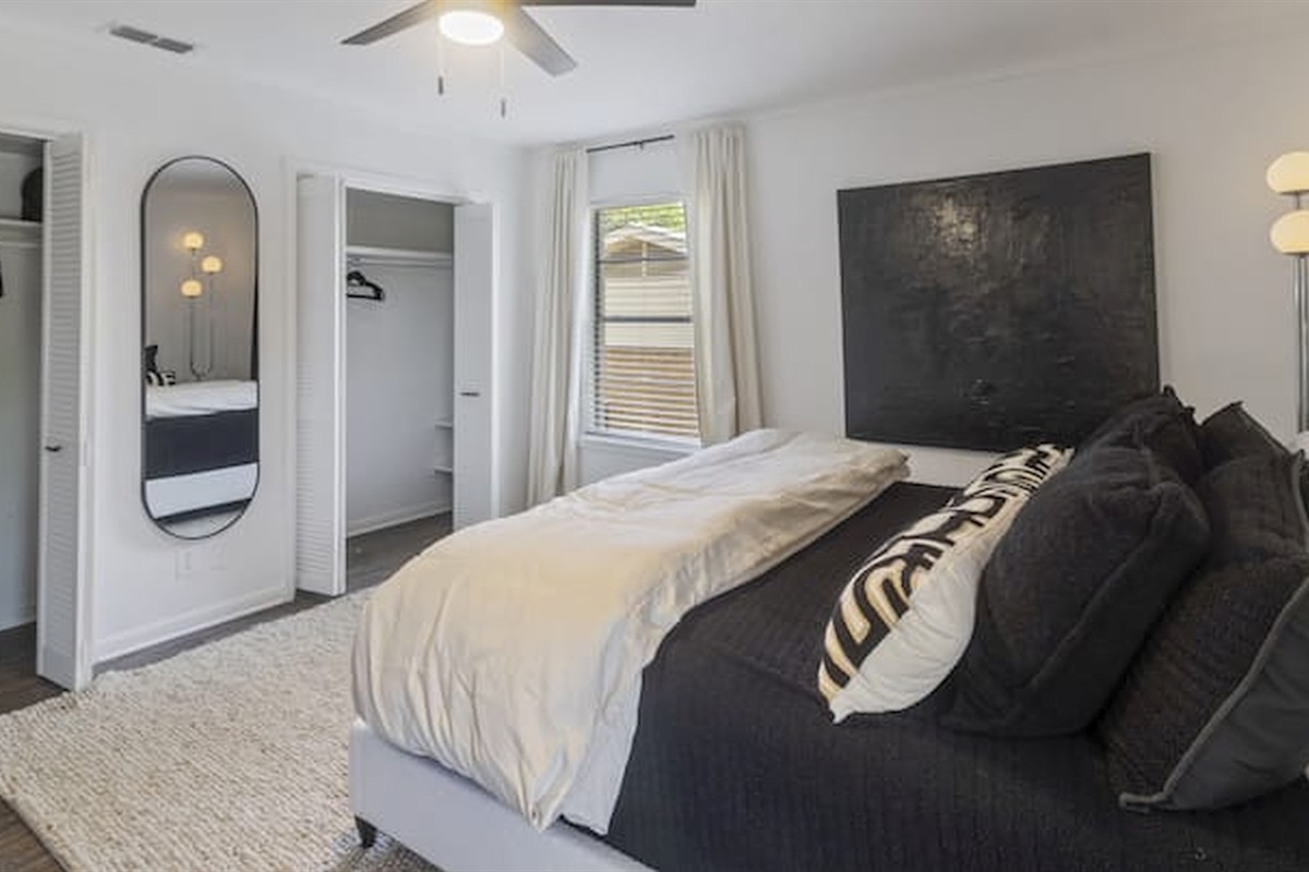 Serene bedroom retreat with clean modern styling and comfortable bedding.