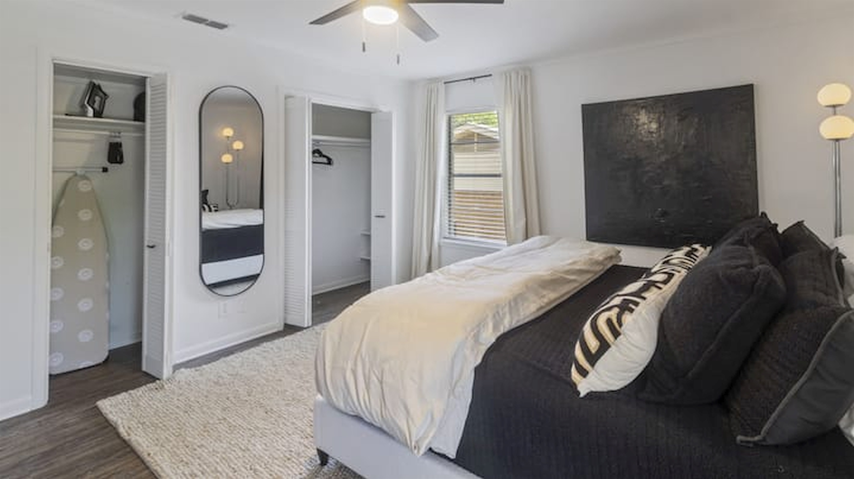 Serene bedroom retreat with clean modern styling and comfortable bedding.