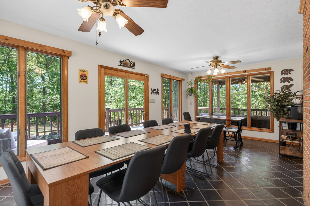 Dining Room: Enjoy meals surrounded by nature and light in this inviting space!