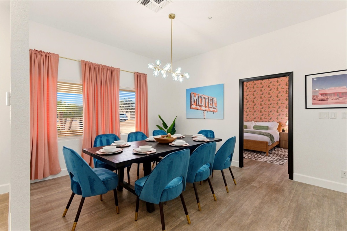 Dining Table seats 8; Small table behind this table seats an additional 4 and bar seats 3!  The pool table room seats another 4 at a high top and 4 at another bar behind the couch!  23 people can comfortably eat a meal between two adjoining rooms!
