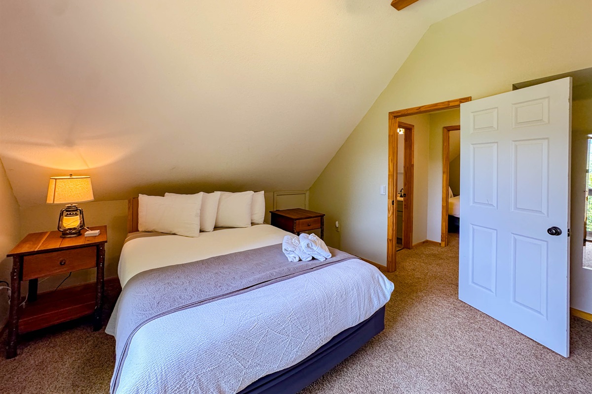 Front Bedroom with mountain views and private balcony!