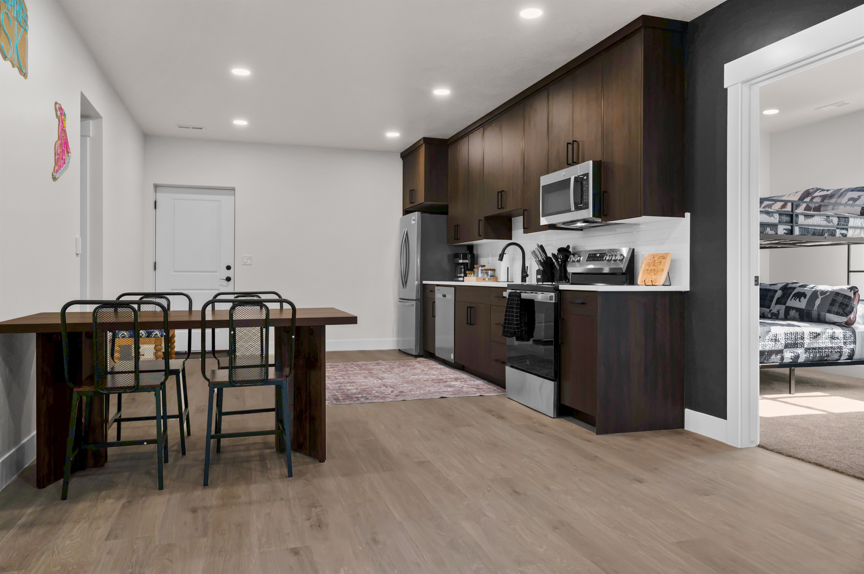 Dining area with modern décor and seating for six guests.
