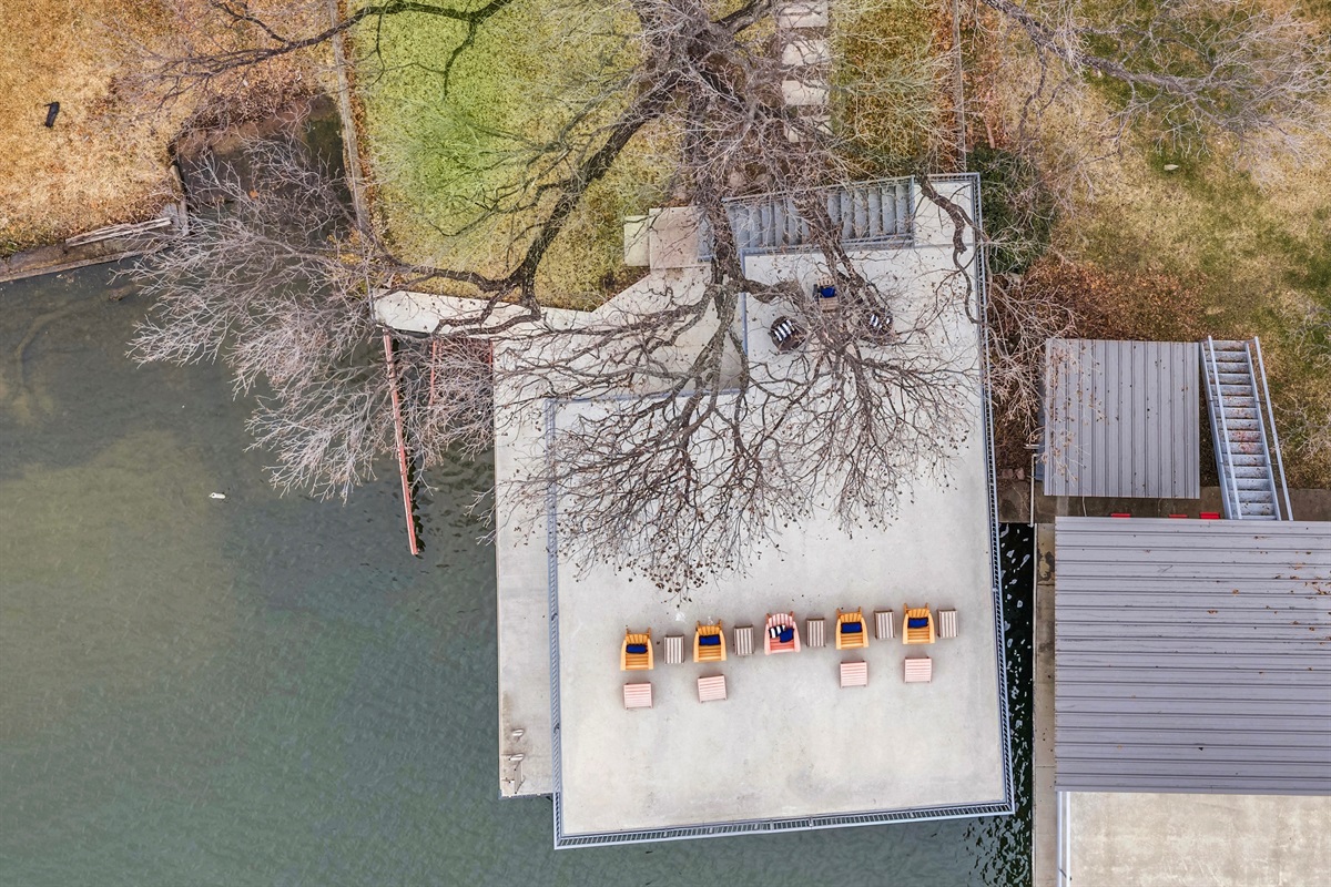 Arial View of Spacious Back Deck Area with shad from tree in Summer