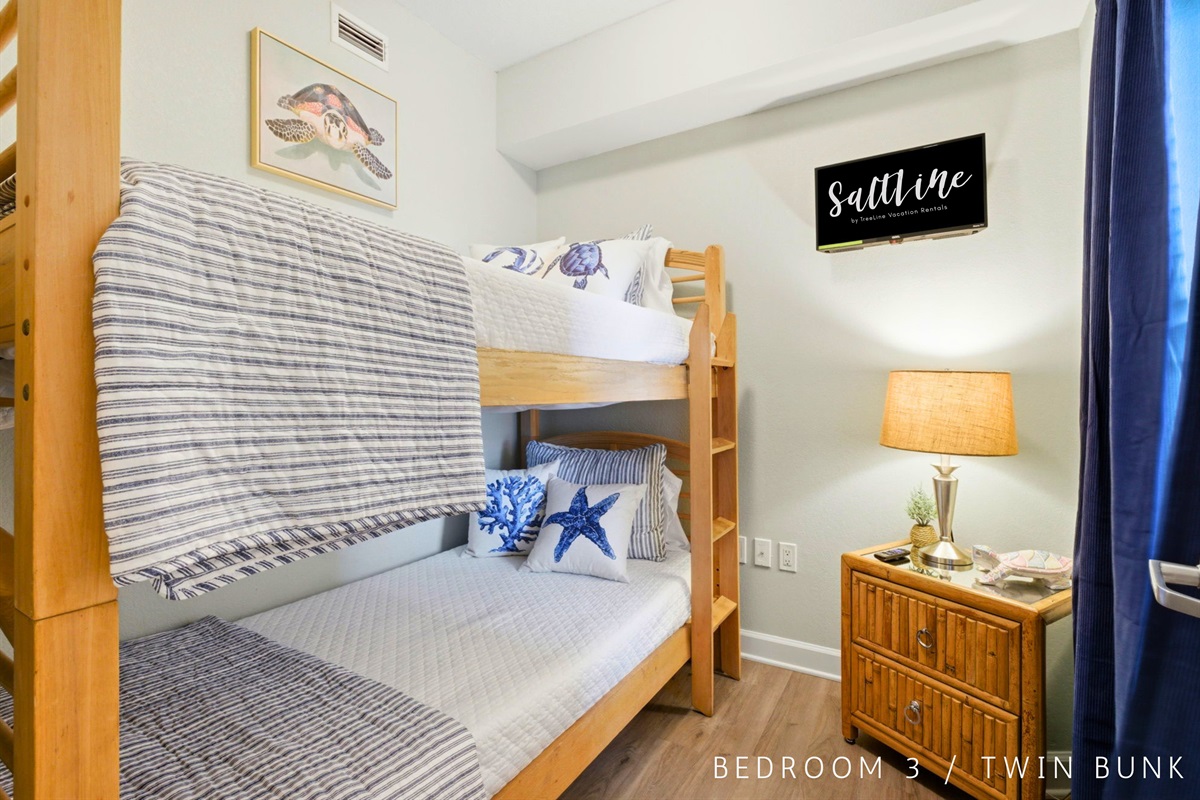 Younger guests will love the cozy bunk beds, creating a fun sleeping space all their own.