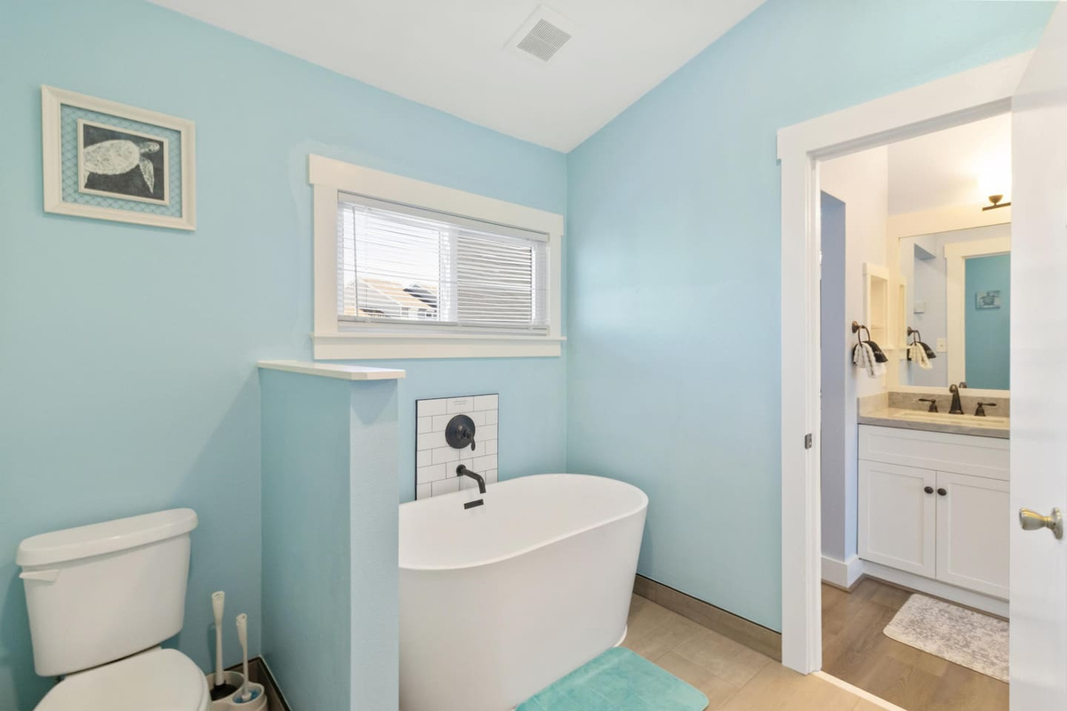Your spacious master bath was just updated with modern finishes &mdash; bright, fresh, and a pleasure to start your day in.