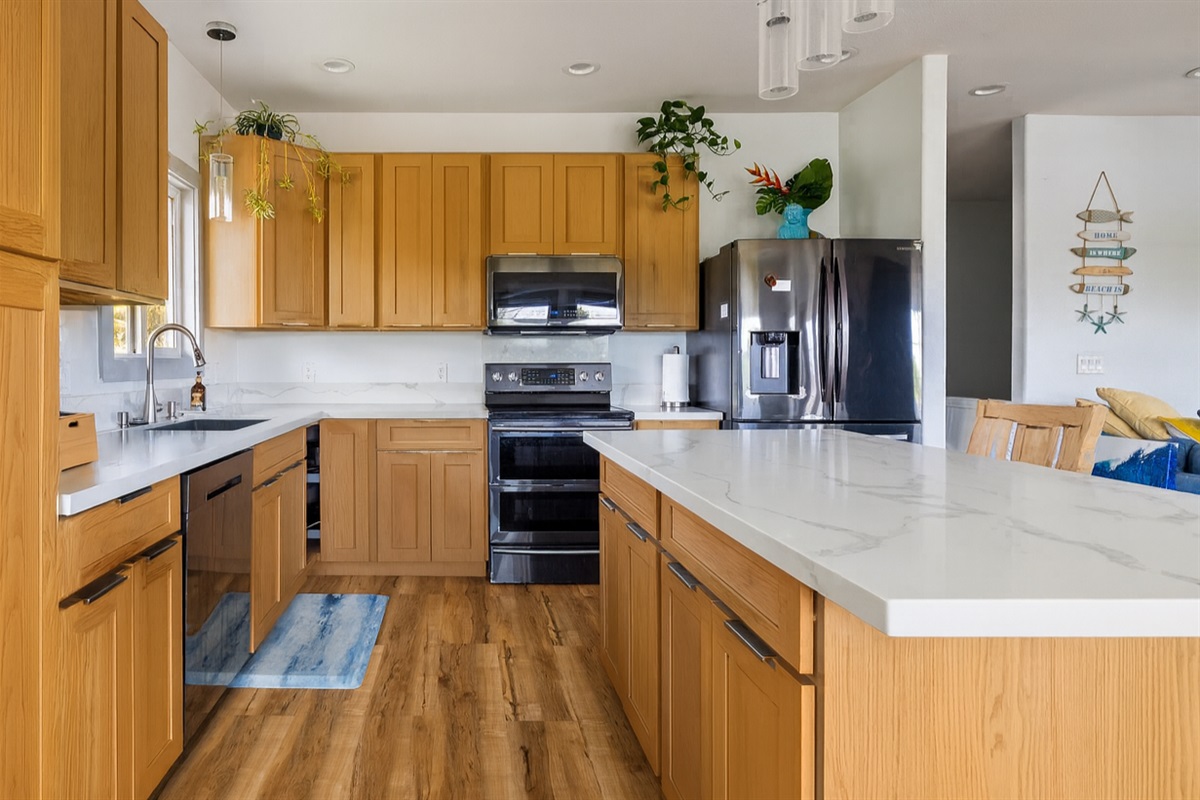 Kitchen | Representative Interior. Finishes & Decor Vary By Unit