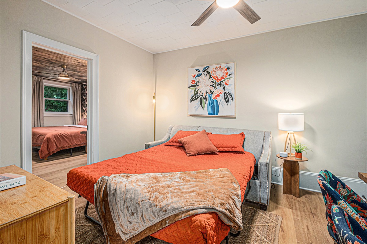 Versatile living area with a sleeper sofa, perfect for unwinding.