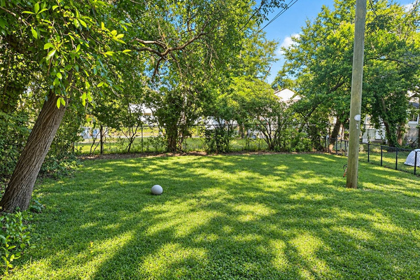 Outdoor Oasis: Expansive green space perfect for games or relaxing under the sun!