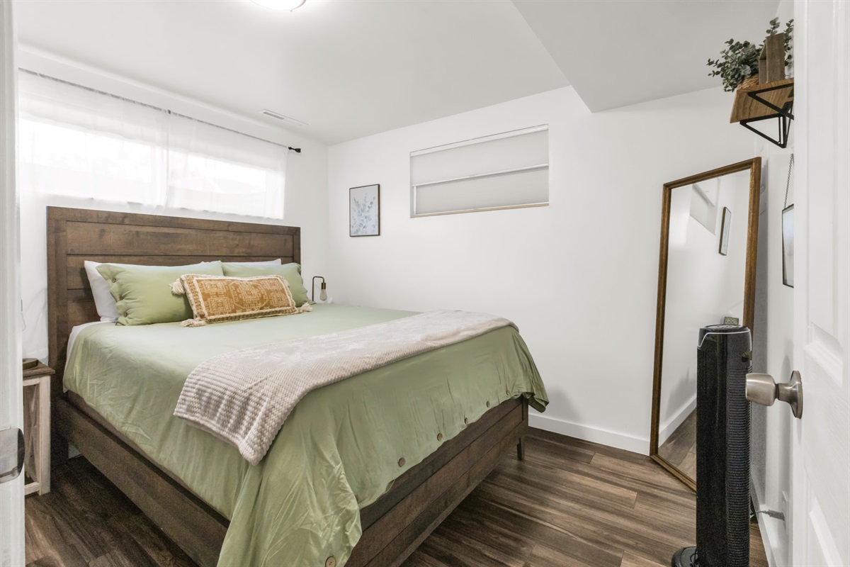 Queen bed in main bedroom