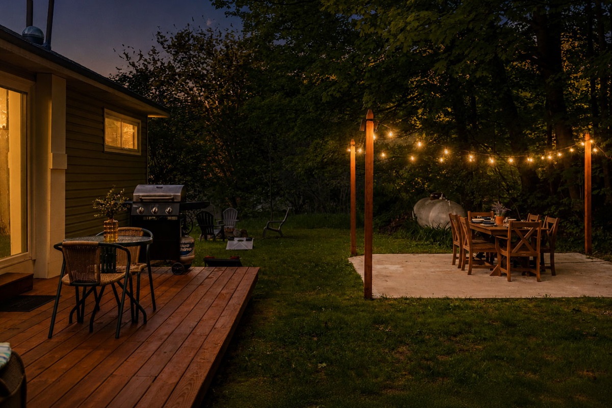 String lights around outdoor dining set