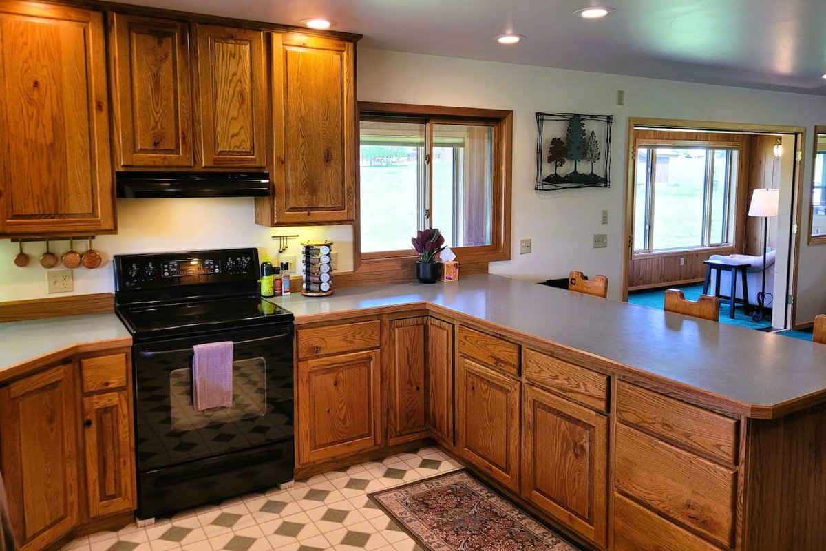 Spacious kitchen outfitted with cookware