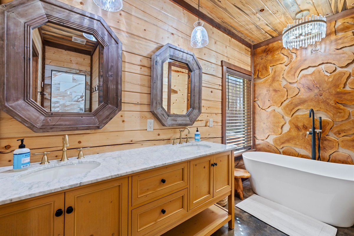 Large vanity and mirror in spacious bathroom.