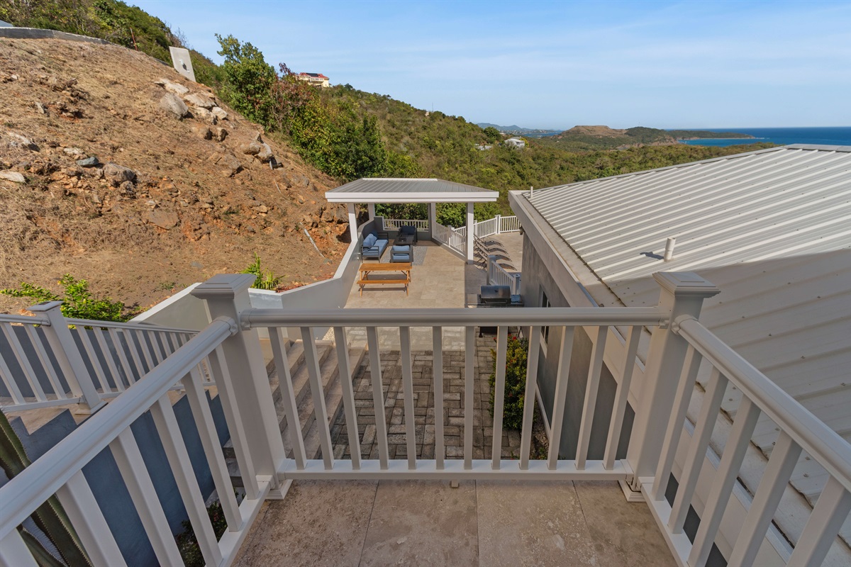 Surrounding hills and coastline create a picture-perfect backdrop.