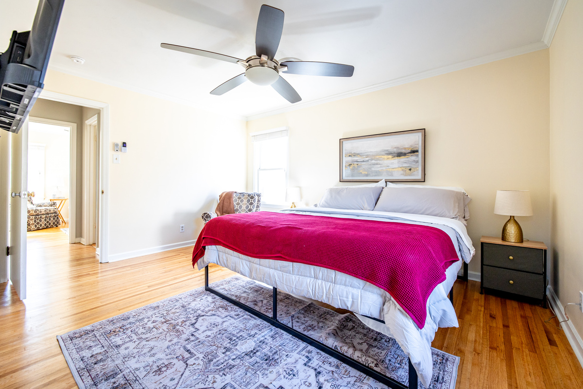 Primary bedroom. King bed. En-suite bathroom. TV