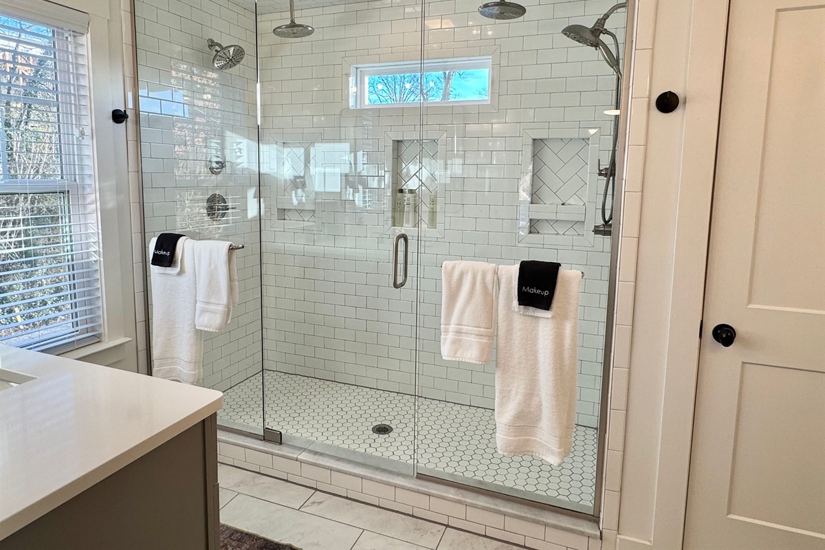 Double the space, double the luxury. This spa-inspired shower features two standard shower heads and two overhead rainfall showers!