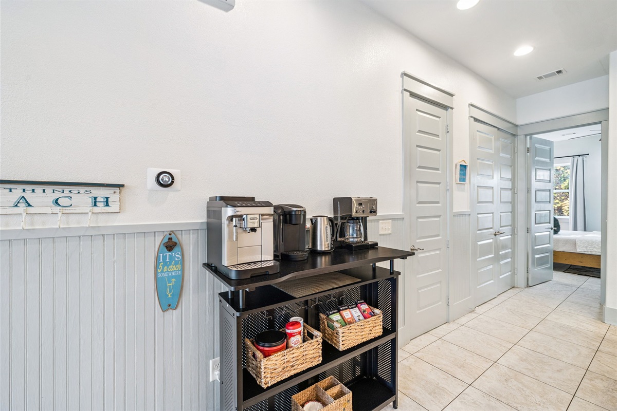 A little luxury for your mornings: a sleek coffee nook that brings comfort, convenience, and great flavor to every day of your stay.