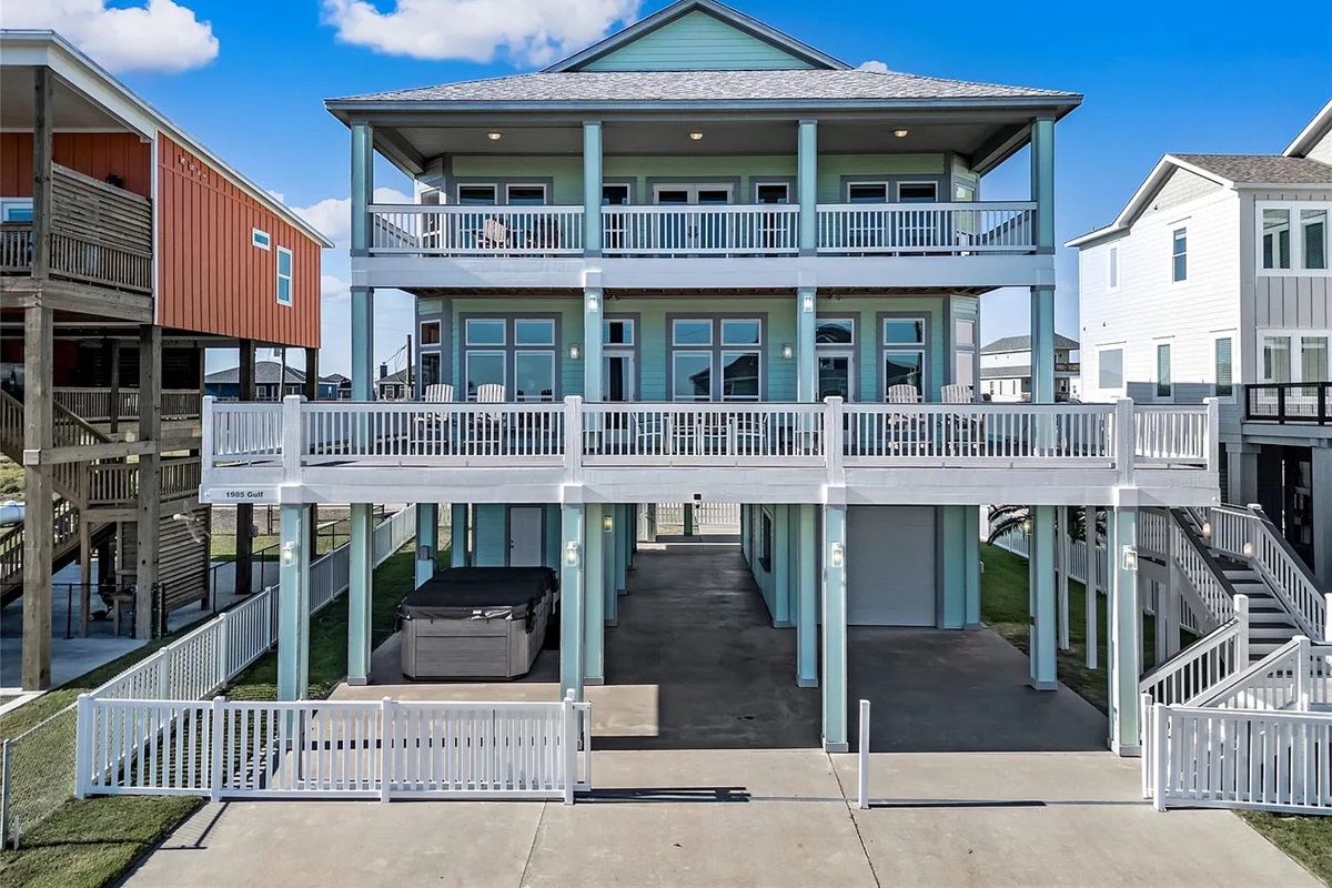 Crystal Paradise Exterior: Your coastal retreat with big balconies, ocean views, and a private hot tub, all for you to enjoy.