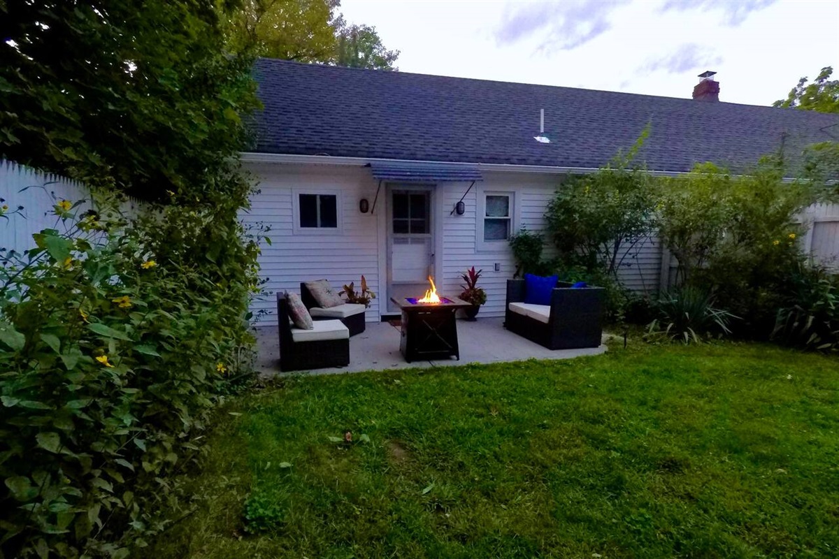 A backyard with gas fire pit for your private use and enjoyment!