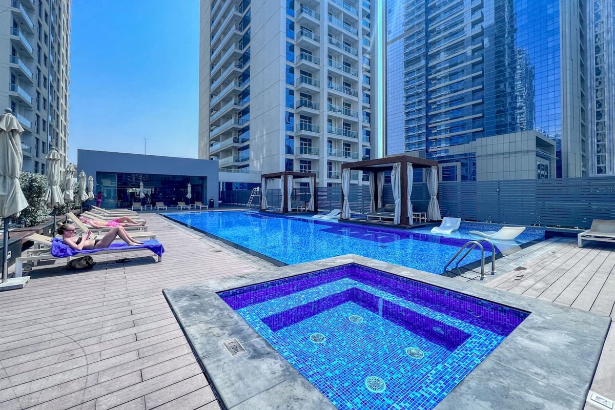 Stunning swimming pool with temperature controlled water, Jacuzzi, sunbeds and cabanas free for guests