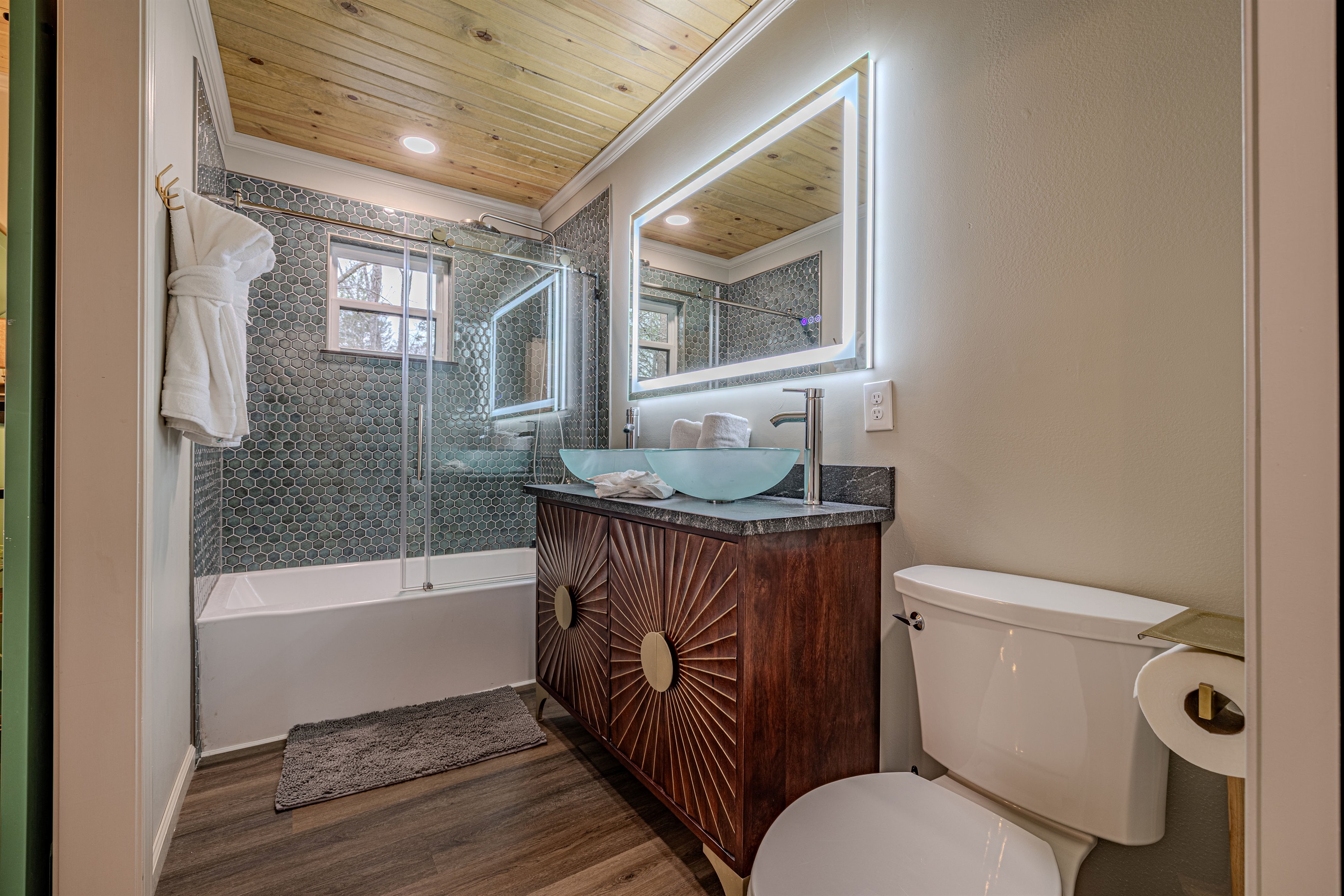 The ensuite bath for Master Suite #2 is modern and bright.