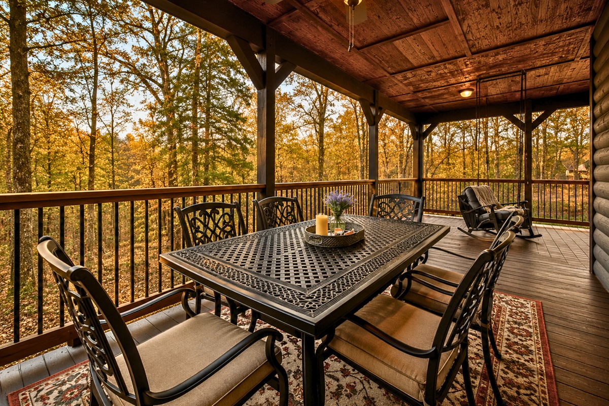Meals enjoyed outdoors feel even better with the wooded backdrop and peaceful atmosphere surrounding the dining area.