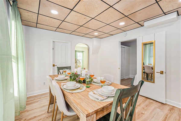 Gather for meals beneath the natural wood ceiling