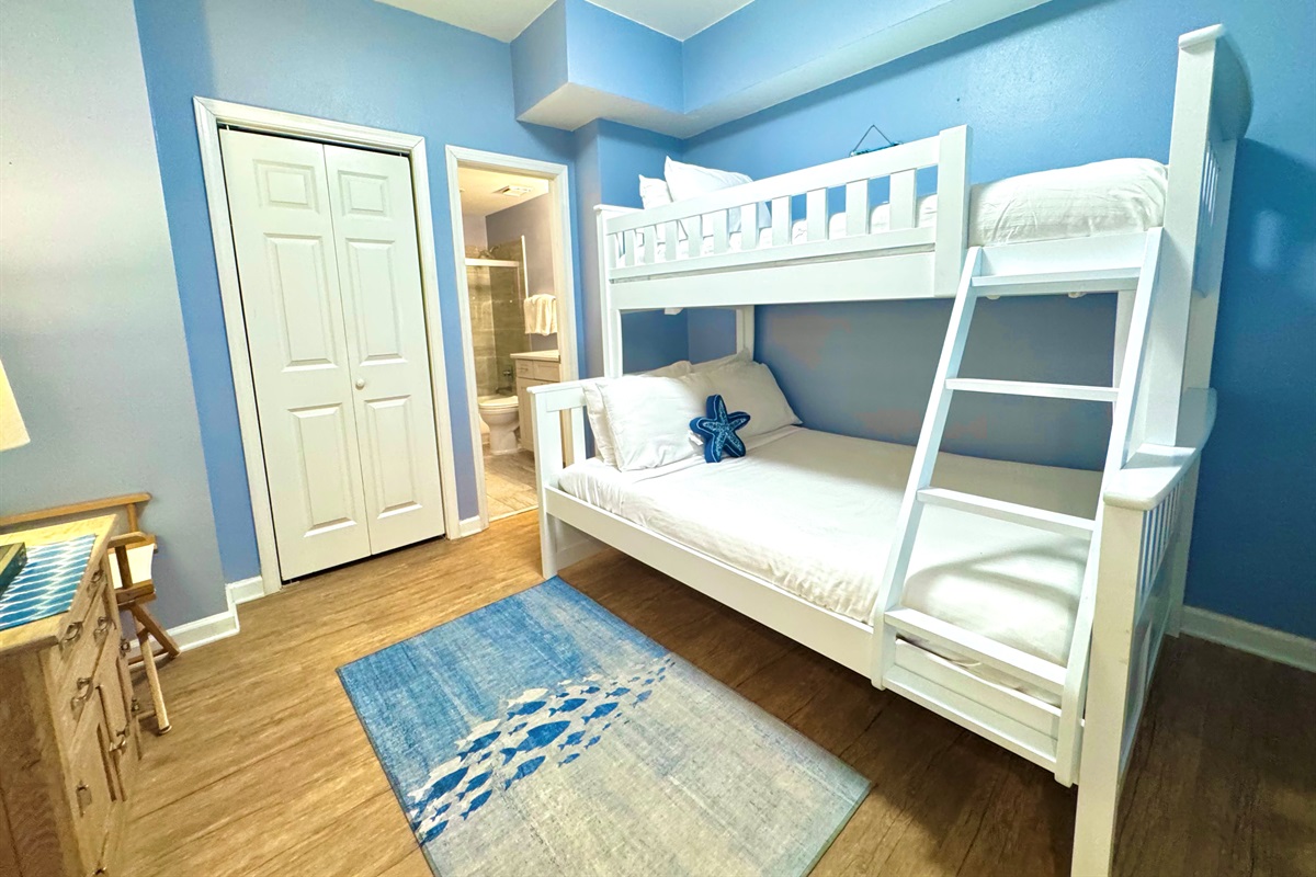 Full size bed on bottom, twin on top.