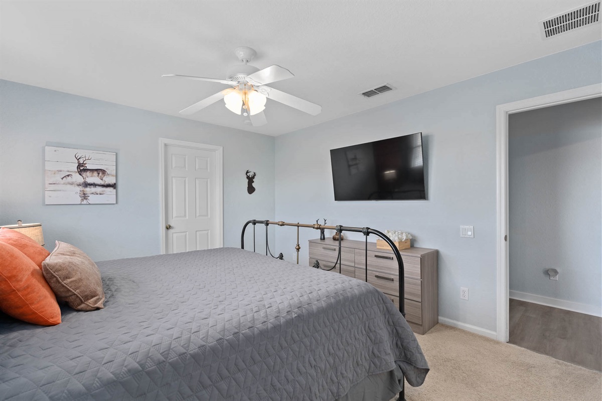 Upstairs king bedroom with 55" TV - Now with luxury vinyl flooring!