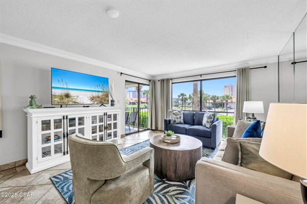 Living area with smart TV, balcony