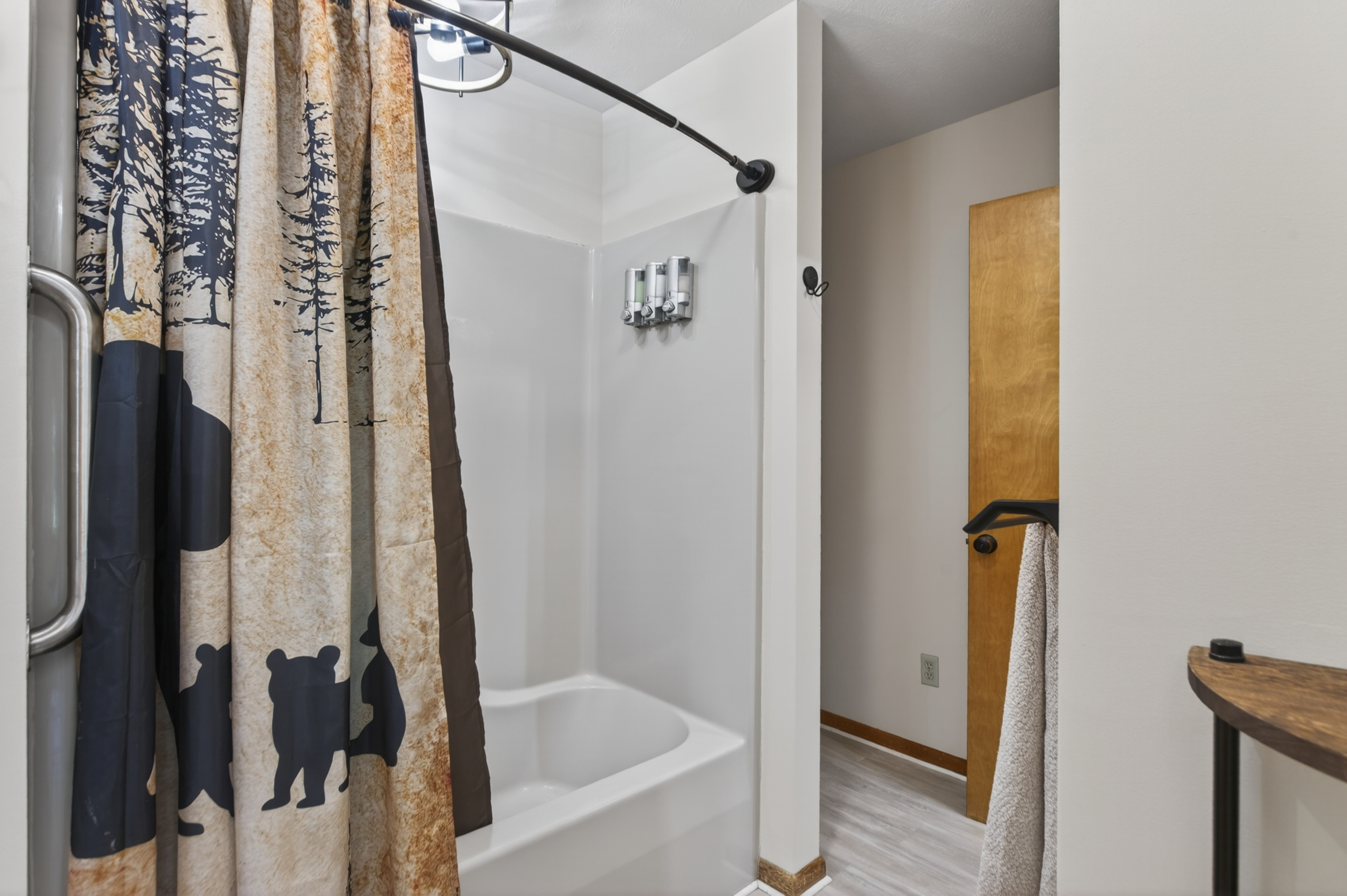 Bathroom Retreat: Refresh in nature-inspired style with bear-patterned shower curtains!