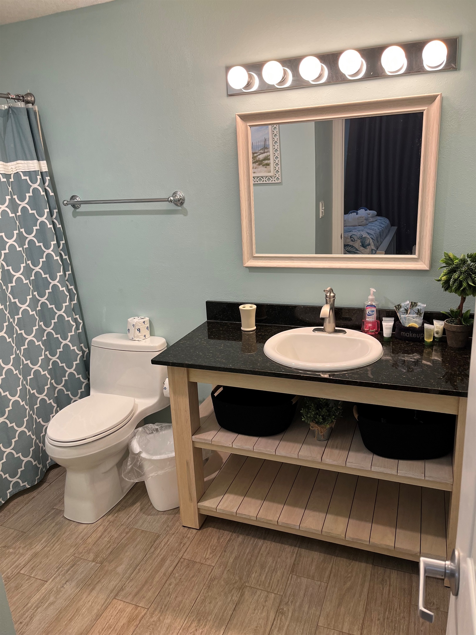 Clean and spacious master bathroom with a large vanity and modern fixtures.