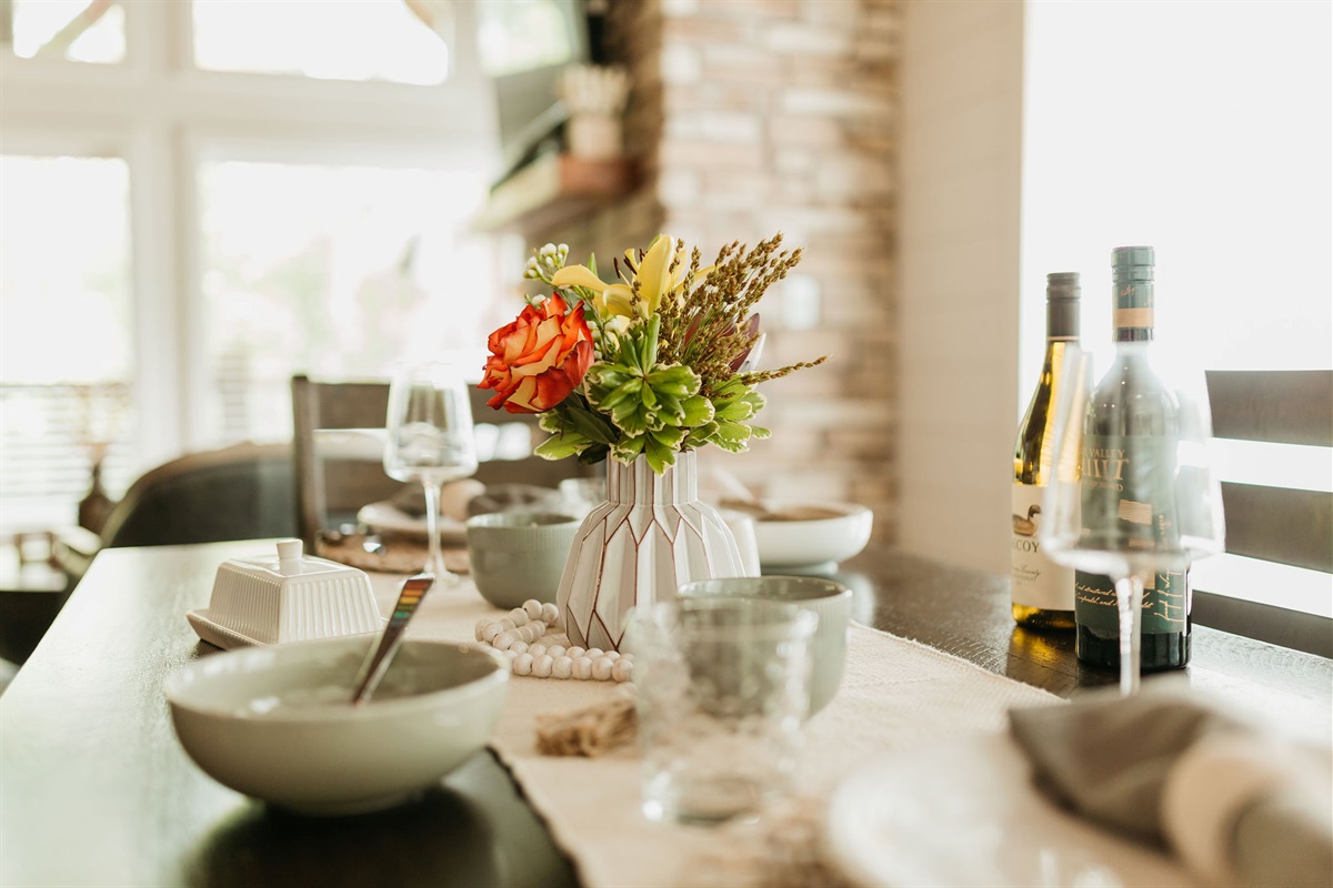 Dining Area: Enjoy meals with a view, surrounded by elegant decor and vibrant florals!