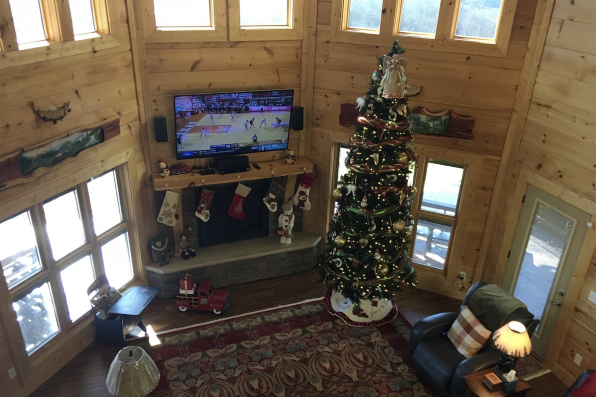 Looking down onto the living room from the overlooking loft.