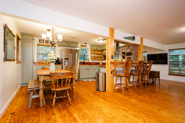 Farmhouse kitchen table and open kitchen bar seating - plenty of room to gather.