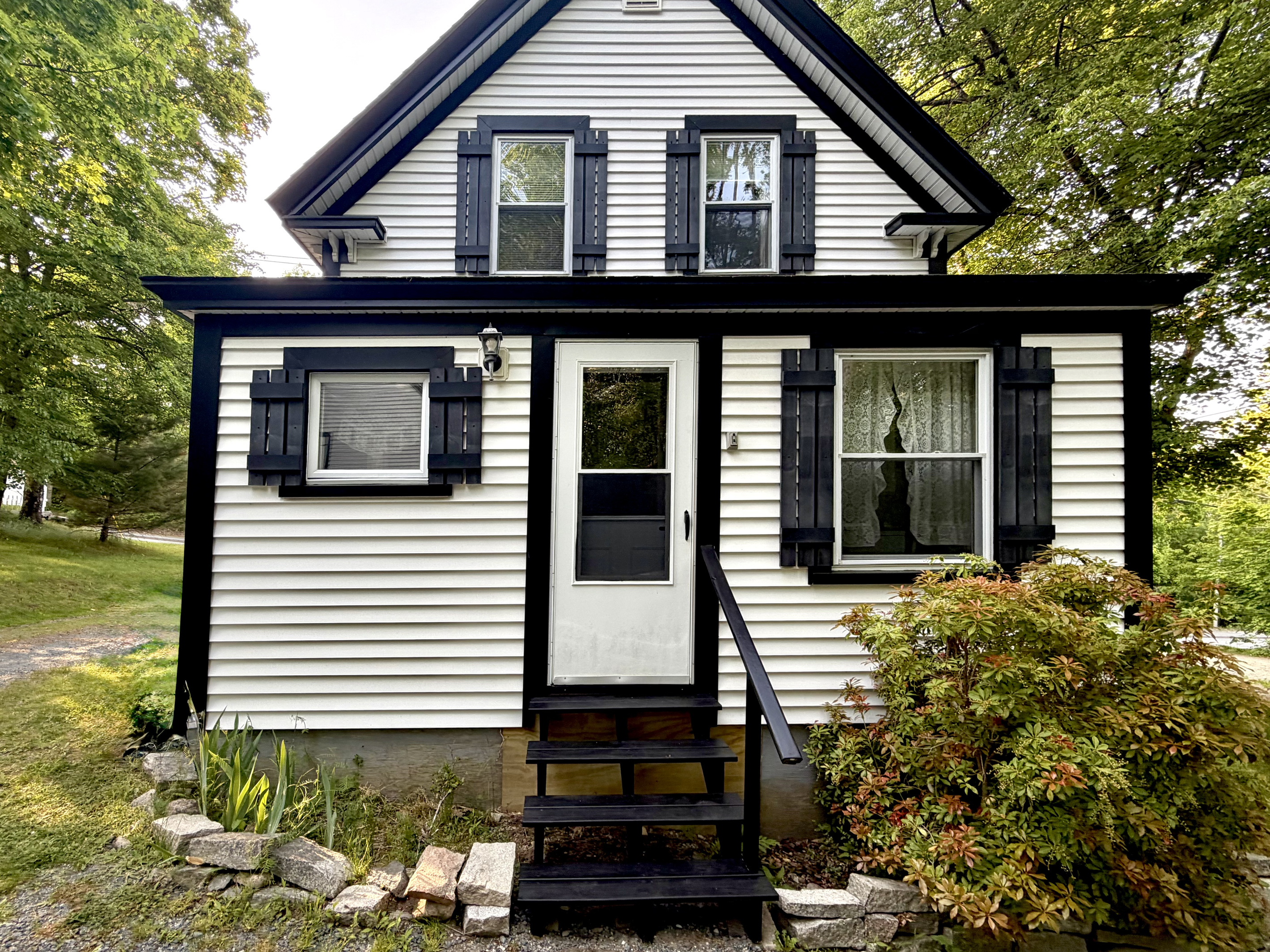 Welcome home. The main guest entrance opens directly into a convenient entry area, laundry nook, and kitchen. This functional setup makes unpacking your bags and settling into your classic MDI basecamp entirely seamless and easy.