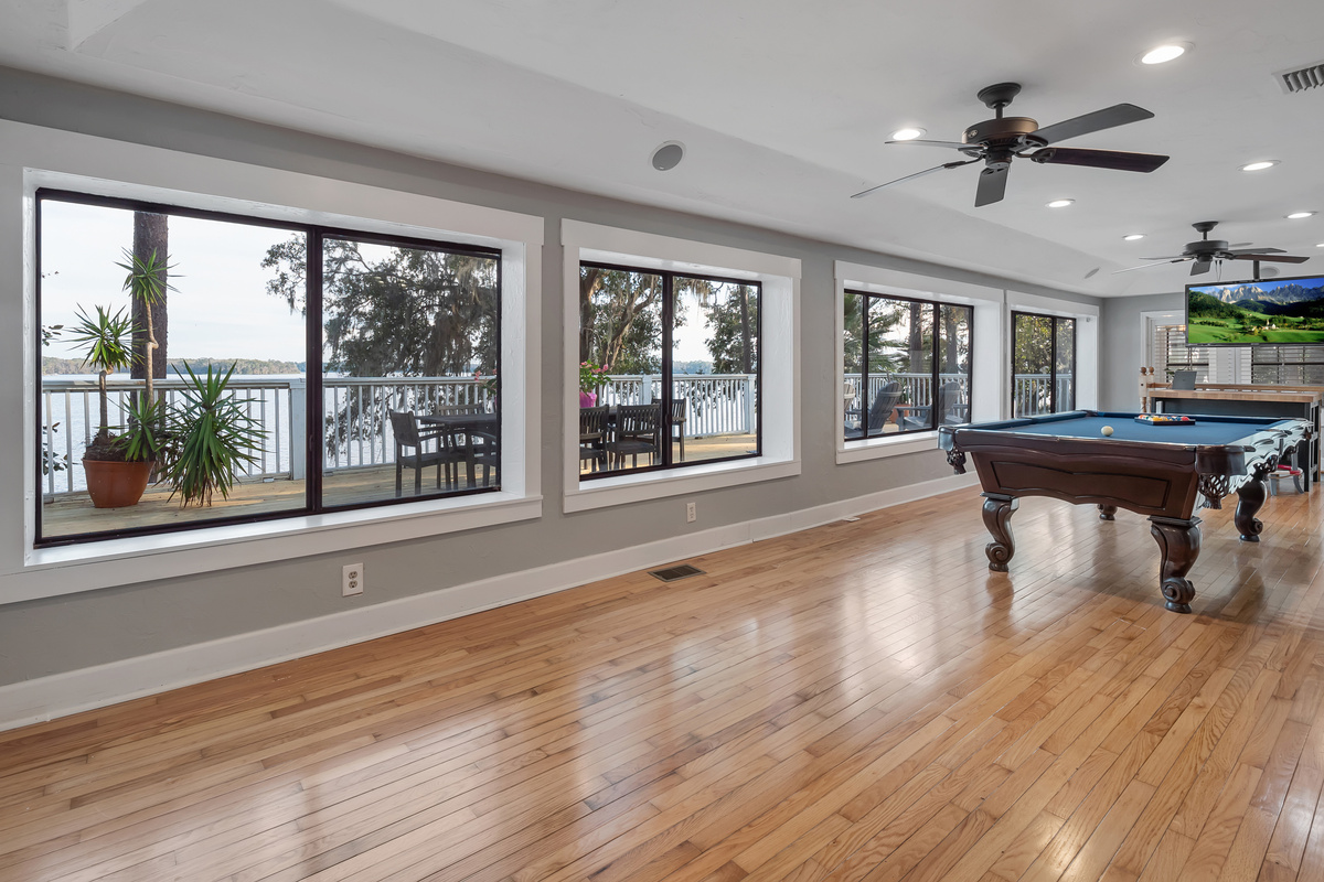 Pool table, lake view, stool seating, tv
