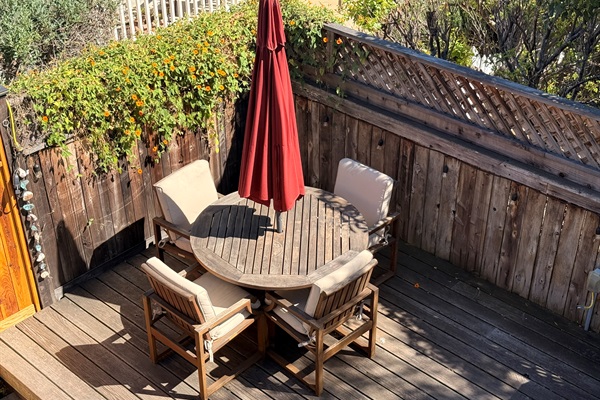Deck dining as seen from primary balcony