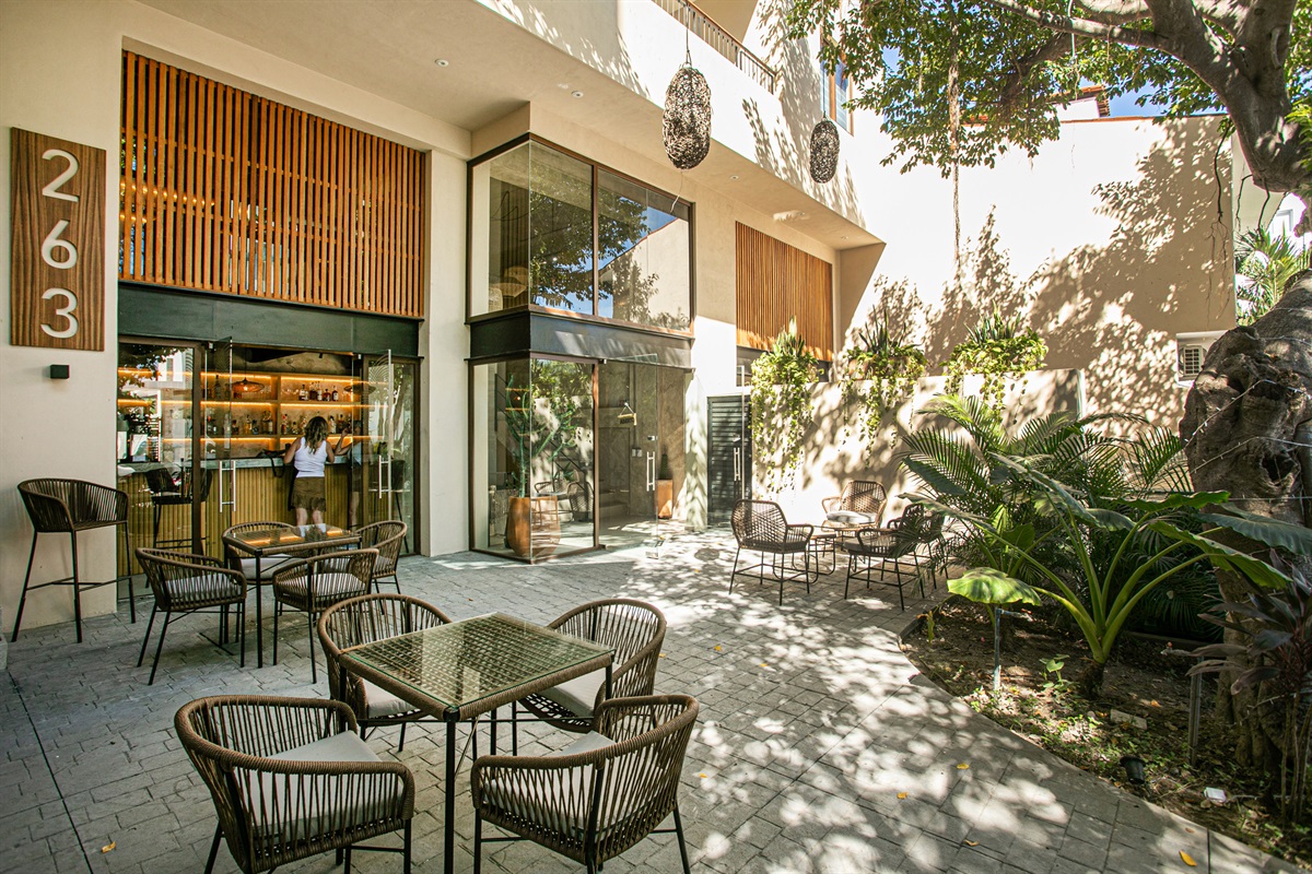 The patio of Sol Versalles in the front of Hidden Park.