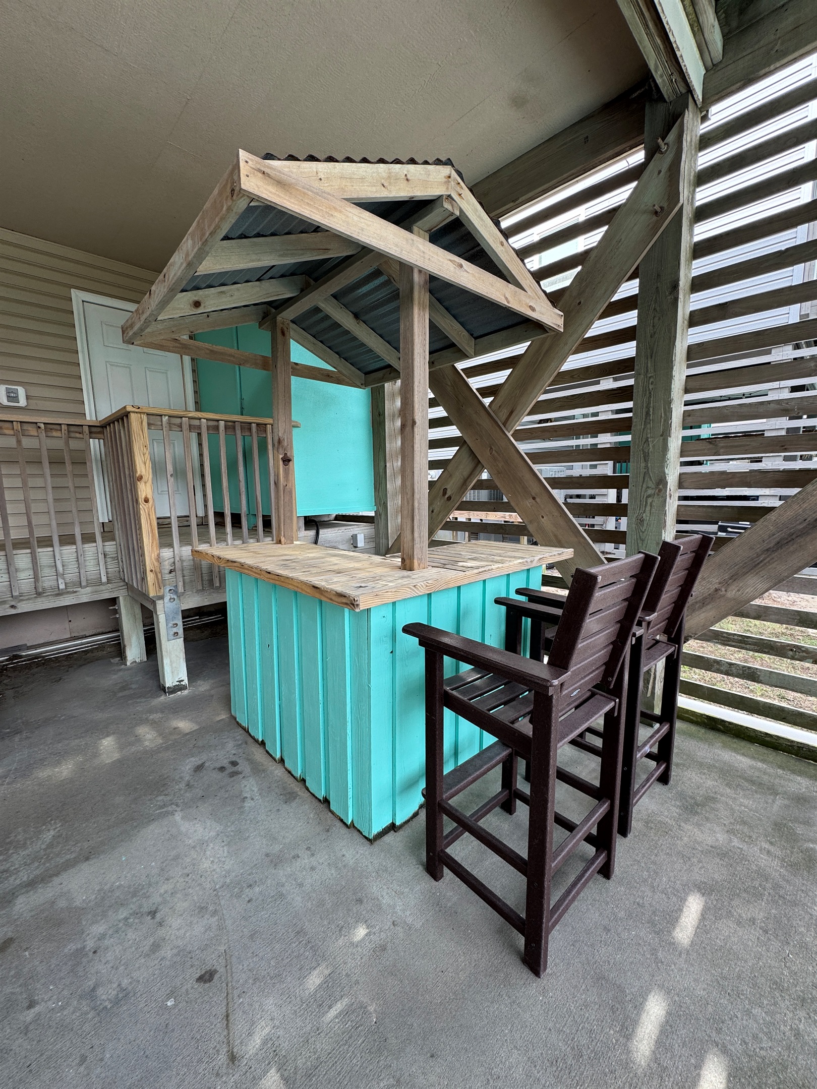 Shady tiki bar, always vacation time here!